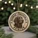 A circular ornament featuring a German longhaired pointer dog's head, with the text "German Longhaired Pointer" around the edge.