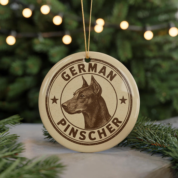 A circular ornament with the text "GERMAN PINSCHER" and a graphic of a German Shepherd dog.