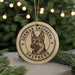 A circular ornament featuring a German Shepherd dog's head, with the text "German Shepherd" around the edge.