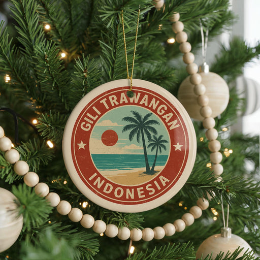 A round ornament on a Christmas tree, featuring a palm tree and the text "GILI TRAWANGAN INDONESIA".