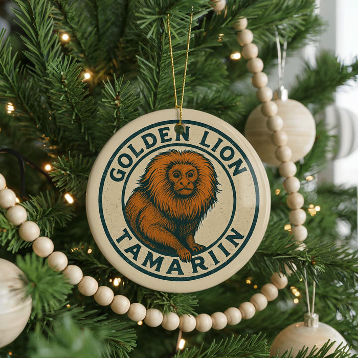 A round ornament on a Christmas tree featuring a golden lion and the text "GOLDEN LION TAMARIN".