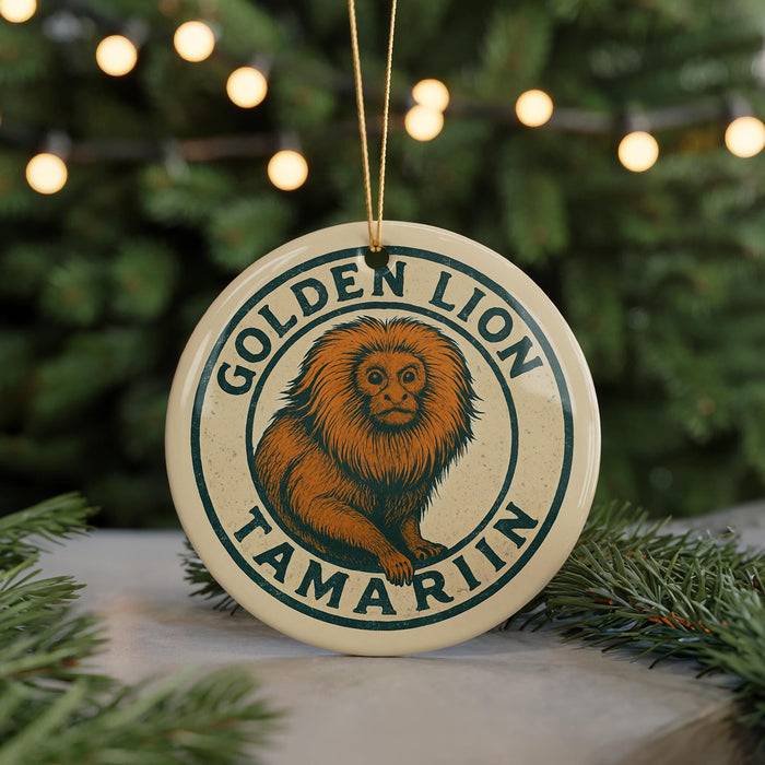 A round ornament with a lion image and the text "GOLDEN LION TAMARIN" on it, hanging from a string.