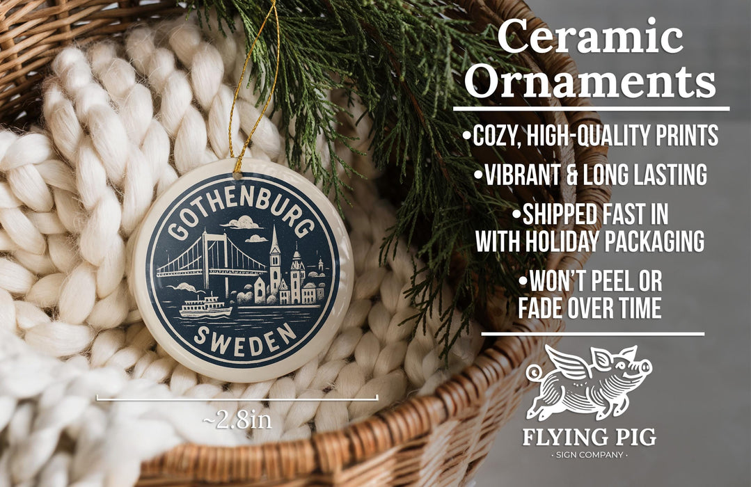 Ceramic ornaments, featuring a design of Gothenburg, Sweden, hanging from a wicker basket.