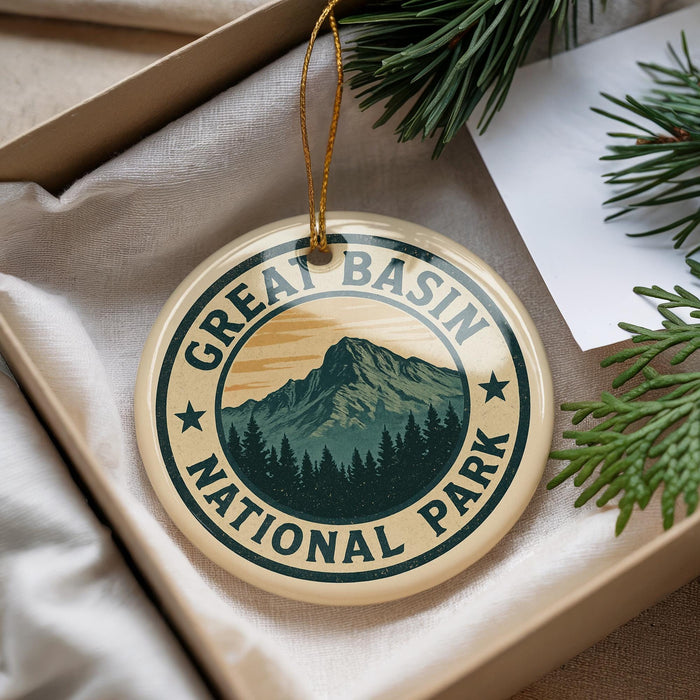 A circular ornament with the text "GREAT BASIN NATIONAL PARK" and a mountain landscape design, hanging from a string.