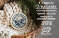 a ceramic ornament with a design of a road and mountains, placed in a woven basket. The ornament is described as a "Ceramic Ornaments" and "Great Ocean Road Australia" design, suggesting it is a decorative item related to the Great Ocean Road in Australia.