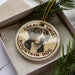 A decorative ornament featuring a close-up image of a Bernese mountain dog, with the text "GREATEST SWISS MOUNTAIN DOG" around the dog's face.