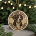 A round ornament featuring a mountain dog, with the text "GREATER SWISS MOUNTAIN DOG" around the dog's face.