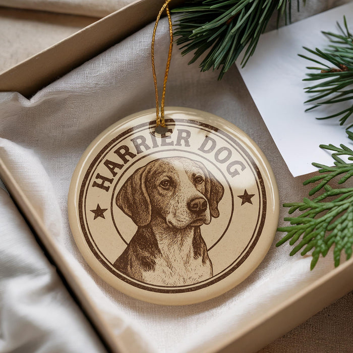 A round ornament with a dog image and the text "HARRIER DOG" is displayed in a box, surrounded by pine branches.