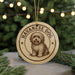 A round ornament featuring a drawing of a dog, with the text "HAVANESE DOG" around the edge.