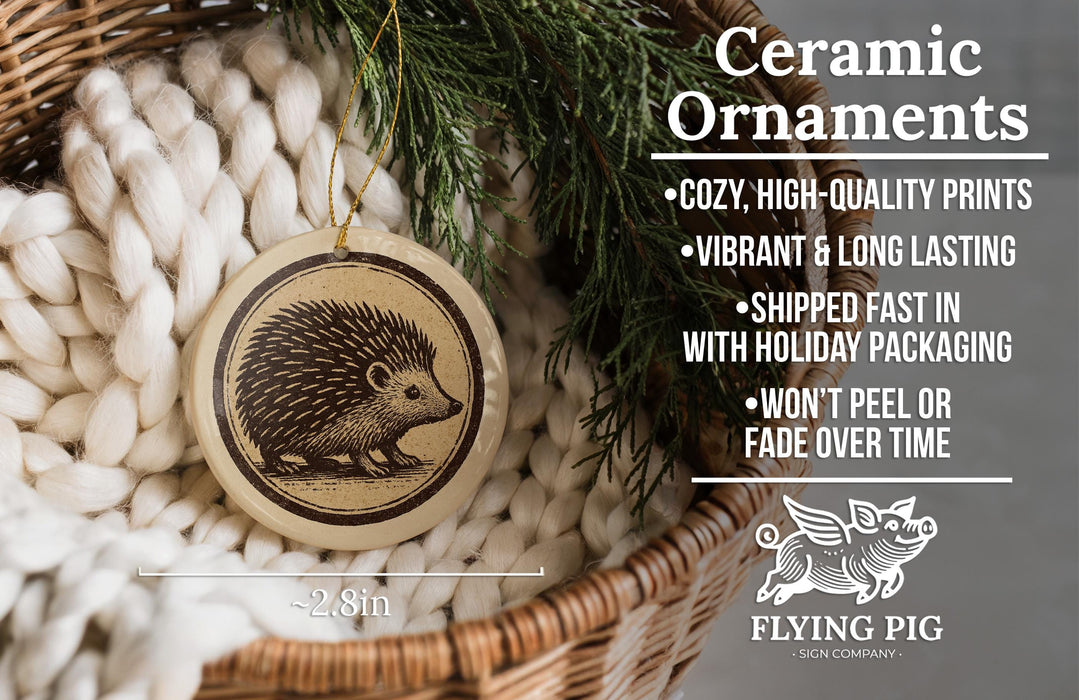 Ceramic ornaments, featuring a porcelain design of a hedgehog, are displayed in a wicker basket.