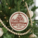 A Christmas tree decorated with ornaments, including a circular ornament with the text "Himeji Castle Japan" and a traditional Japanese temple illustration.