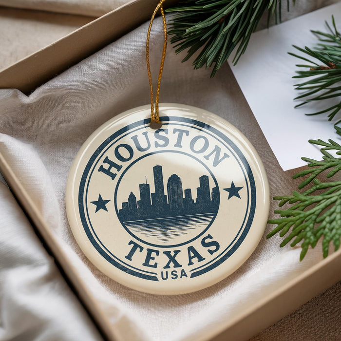 A circular ornament with the text "HOUSTON TEXAS USA" printed on it, featuring a silhouette of a city skyline.