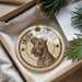 A circular ornament featuring an illustration of an Irish Terrier dog, with the text "Irish Terrier" prominently displayed.