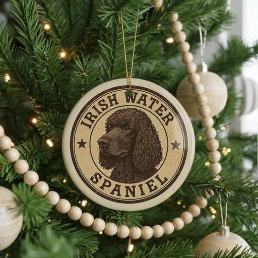 A circular ornament on a Christmas tree featuring an image of an Irish Water Spaniel dog.