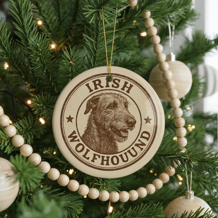 A circular ornament on a Christmas tree featuring an image of an Irish Wolfhound dog.