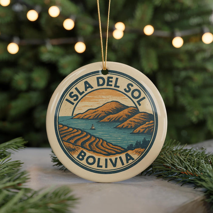 A circular ornament with the text "ISLA DEL SOL BOLIVIA" and an illustration of a mountainous landscape with a small boat on the water.