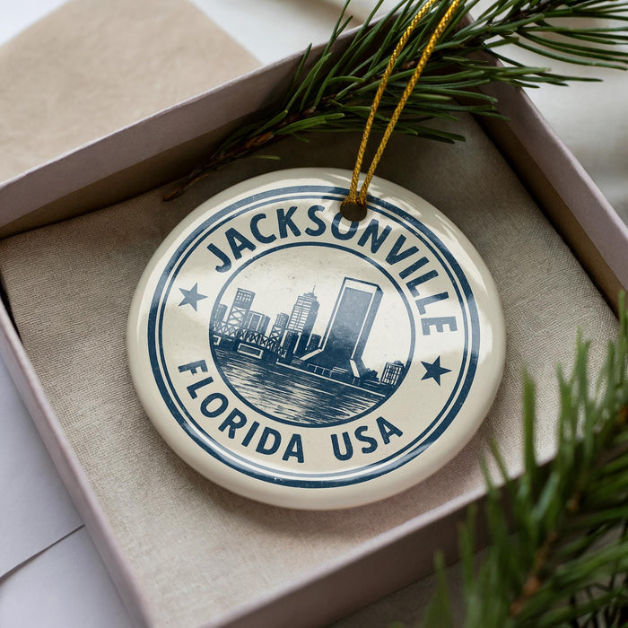 A circular ornament with the text "JACKSONVILLE FLORIDA USA" printed on it, surrounded by pine branches.