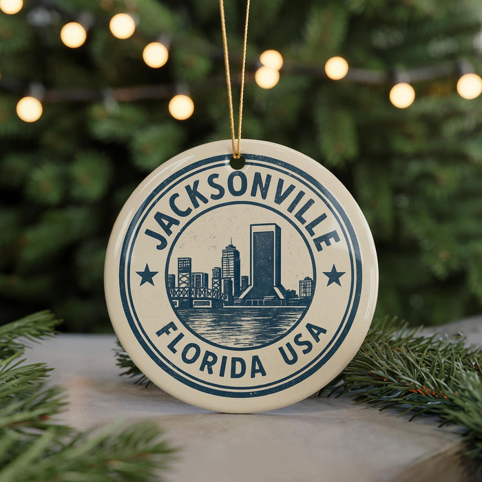 A circular ornament with the text "JACKSONVILLE FLORIDA USA" and a graphic of a city skyline, hanging from a string.