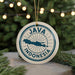 A circular ornament with the text "JAMA INDONESIA" printed on it, featuring a map of Indonesia.