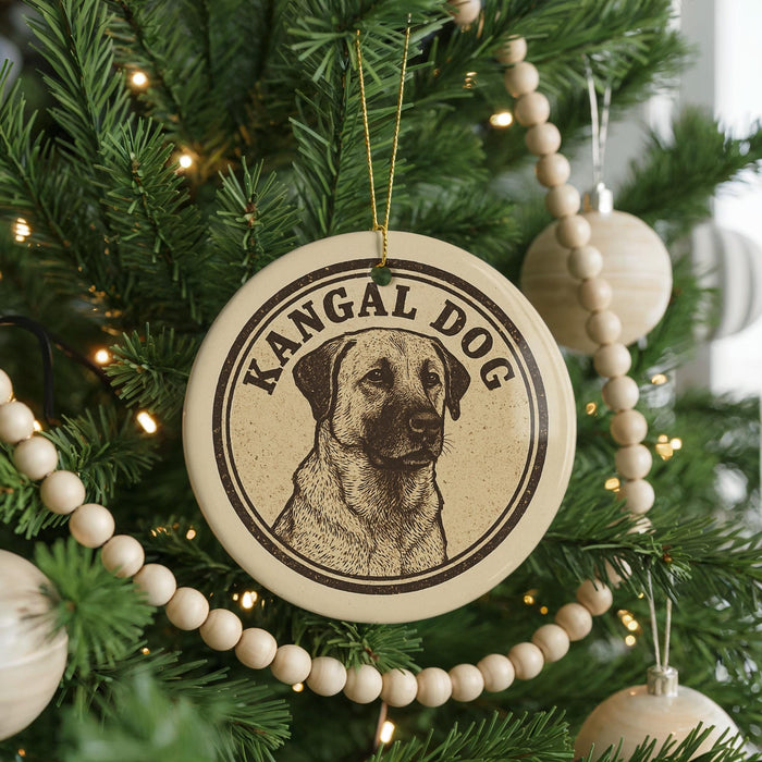 A circular ornament on a Christmas tree featuring a kangaroo dog, with the text "KANGAL DOG" printed on it.