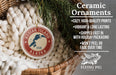 Ceramic ornaments, featuring a decorative design of Alaska on a red and white circular ornament, are displayed in a woven basket.