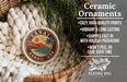 Ceramic ornaments, featuring a round ornament with a tropical design, are displayed in a woven basket.