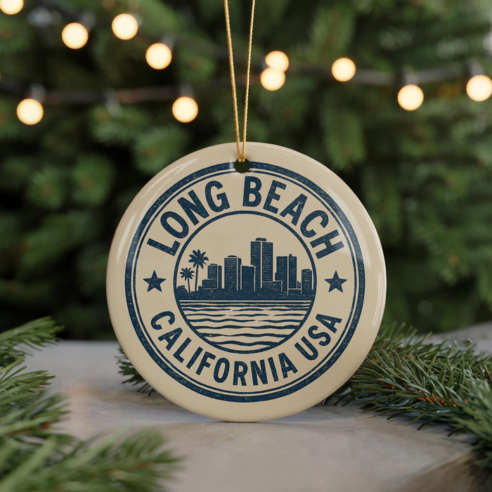 A circular ornament with the text "LONG BEACH CALIFORNIA USA" printed on it, featuring a graphic of a city skyline.