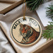 A decorative ornament featuring a close-up image of a tiger's face, with the text "MALAYAN TIGER" printed on it.