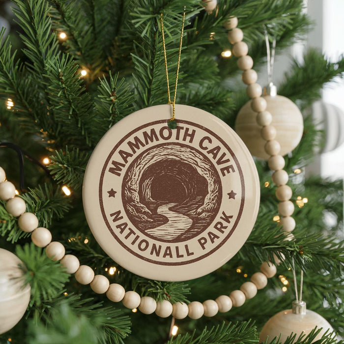 A Christmas tree decorated with ornaments, including a circular ornament with the text "MAMMOTH CAVE NATIONAL PARK" printed on it.