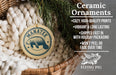 Ceramic ornaments, featuring a Manatee seal, are displayed in a woven basket.