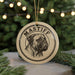 A circular ornament featuring a dog's head, with the text "MASTIFF" written around the edge.