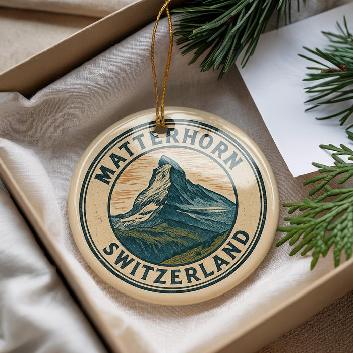 A circular ornament with the text "MATTERhorn SWITZERLAND" and an illustration of a mountain, hanging from a string.