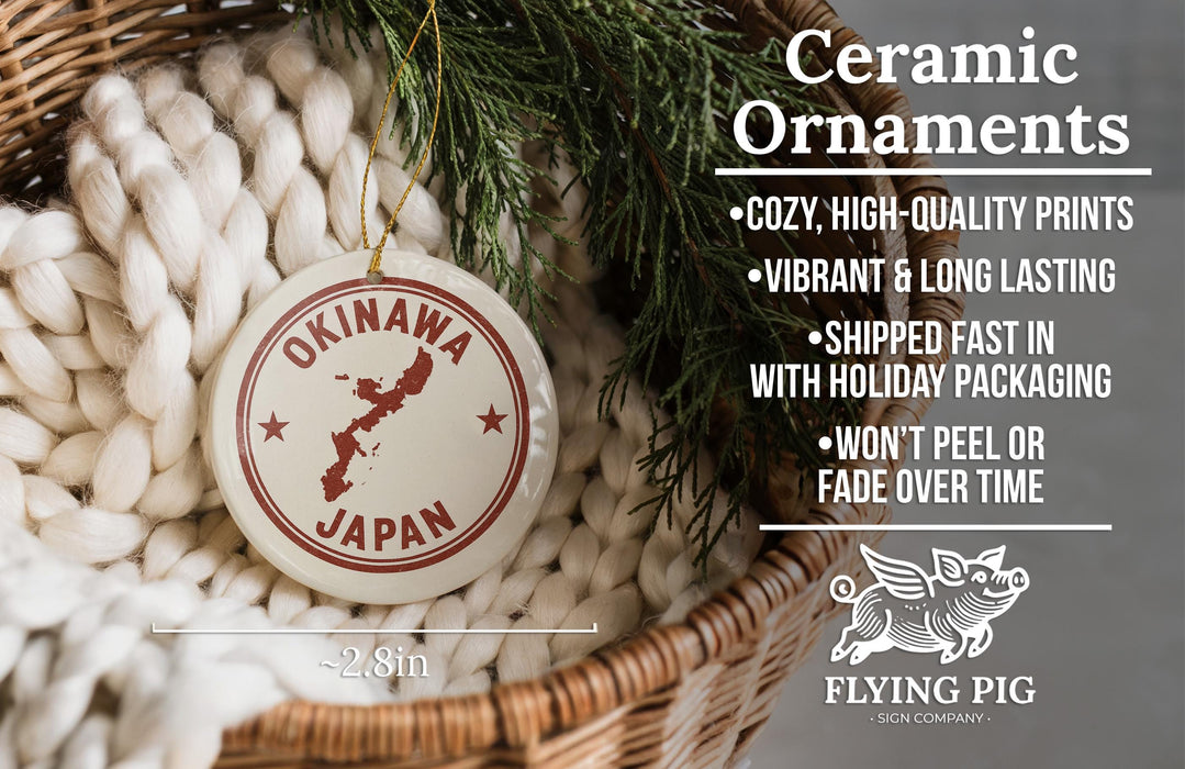 Ceramic ornaments, including a round ornament with the text "OKINAWA JAPAN" and a wicker basket with greenery.