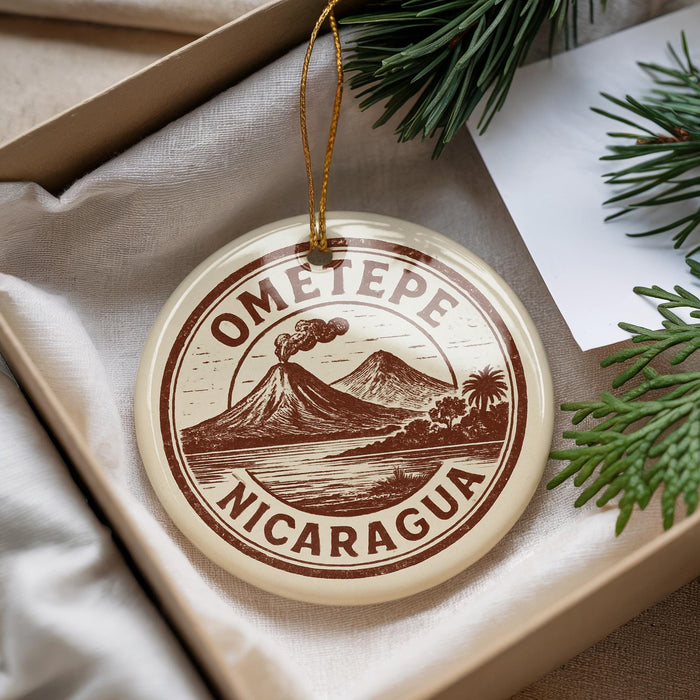 A circular ornament with the text "OMETOPE" and "NICARAGUA" printed on it, hanging from a string.