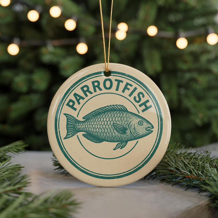 A round ornament with the word "PARROTFISH" and a fish illustration, hanging from a string.