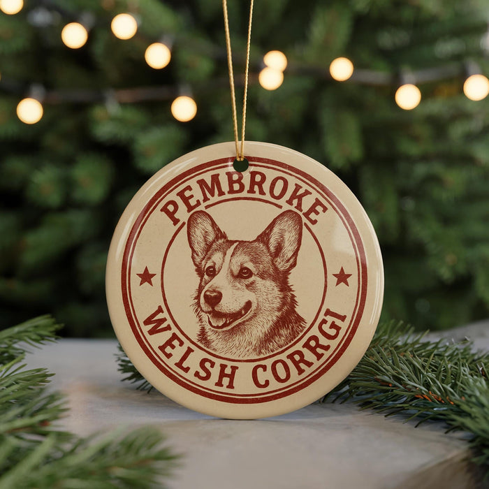 A circular ornament featuring a Welsh Corgi dog's face, with the text "PEMBROKE WELSH CORRGI" printed on it.