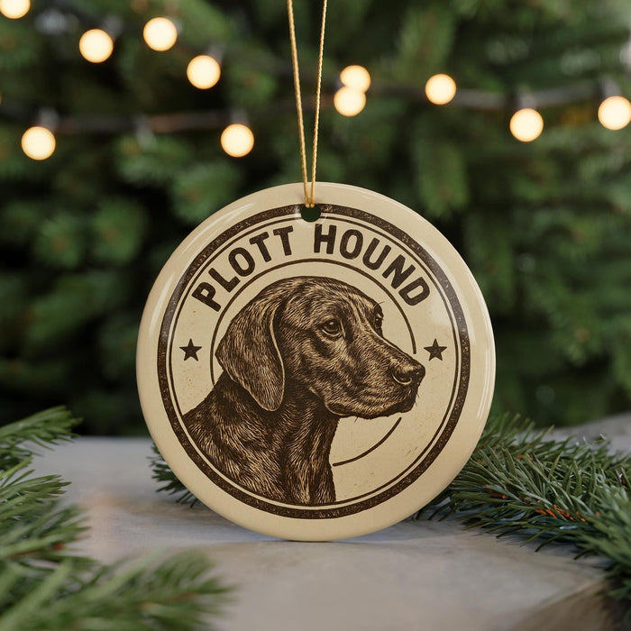 A round ornament featuring a close-up of a hound dog's head, with the text "PLOTT HOUND" around the edge.