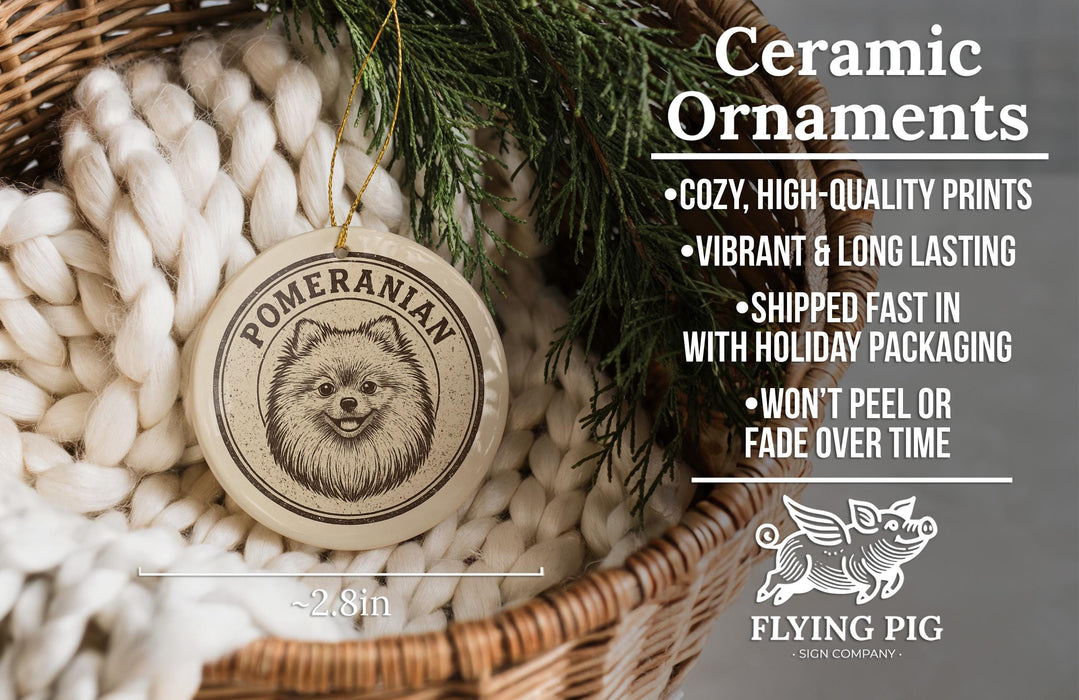 Ceramic ornaments featuring a Pomeranian dog, with a wicker basket and greenery in the background.