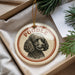 A round ornament with a poodle image and the word "Poodle" written on it, hanging from a string.