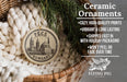 Ceramic ornaments, featuring a round ornament with a design of a building and the text "PECS Hungary" on it, hanging from a wicker basket.