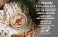 Ceramic ornaments, including a ceramic ornament with a kangaroo design, are displayed in a woven basket.