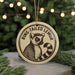 A round ornament featuring a lemur, with the text "RING-TAILED LEMUR" printed on it.