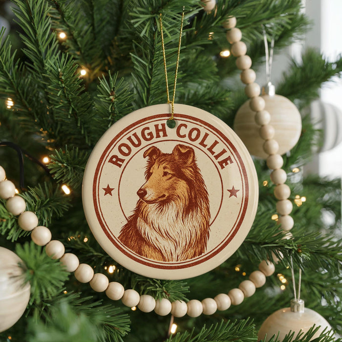 A Christmas tree decorated with ornaments, including a circular ornament with a collie image and the text "ROUGH COLLIE" on it.