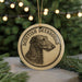 A circular ornament featuring a close-up of a Scottish Deerhound dog's head, with the text "SCOTTISH DEERHOUND" printed on it.