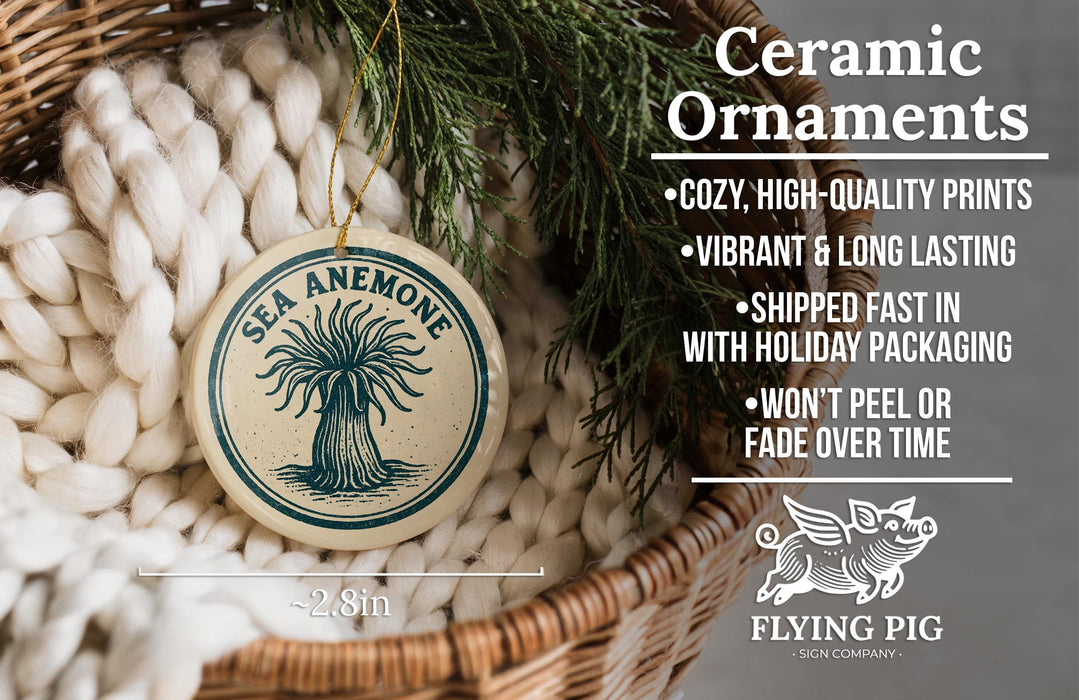 Ceramic ornaments, featuring a sea anemone design, are displayed in a woven basket.