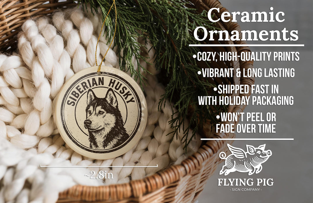 Ceramic ornaments featuring a Siberian husky, with a wicker basket and greenery in the background.