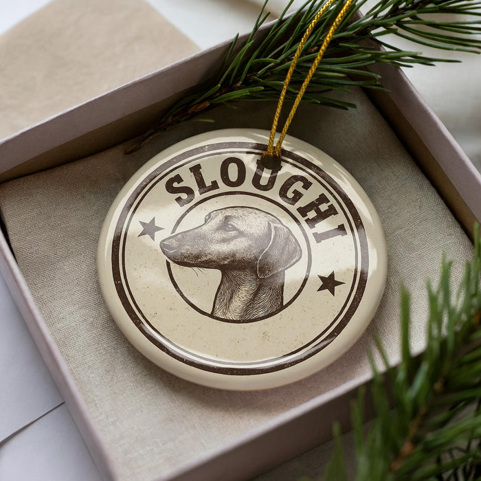 A circular ornament with the word "SLOUGH" written on it, featuring a dog's head in profile.