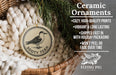 Ceramic ornaments, specifically a ceramic bird ornament, are displayed in a wicker basket. The text highlights the ornament's features, such as being cozy, high-quality, vibrant, and long-lasting, and mentions that it is shipped fast with holiday packaging and won't peel or fade over time.