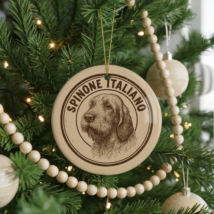 A Christmas tree decorated with ornaments, including a circular ornament with a dog's face and the text "Spinone Italiano".