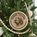 A Christmas tree decorated with ornaments, including a circular ornament with a dog's face and the text "Spinone Italiano".